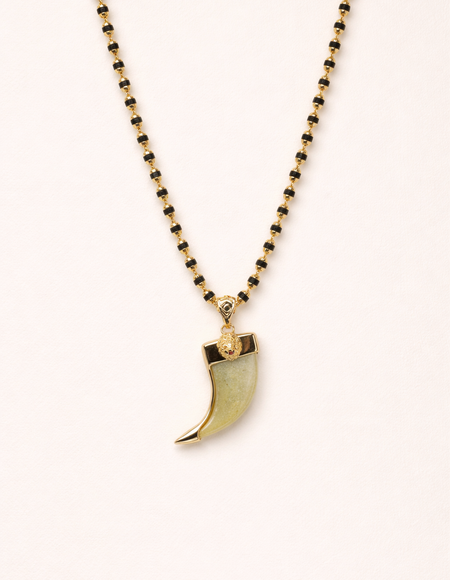 gold plated chain with tiger claw pendent