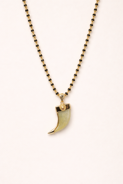gold plated chain with tiger claw pendent