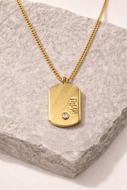 Gold tone chain with pendent