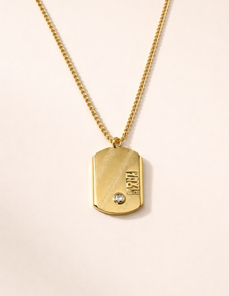 Gold tone chain with pendent