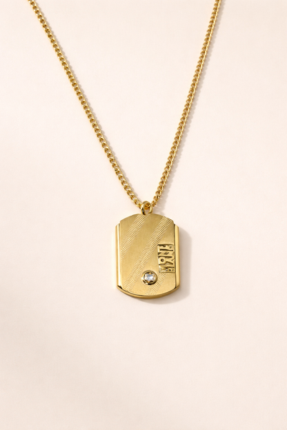 Gold tone chain with pendent