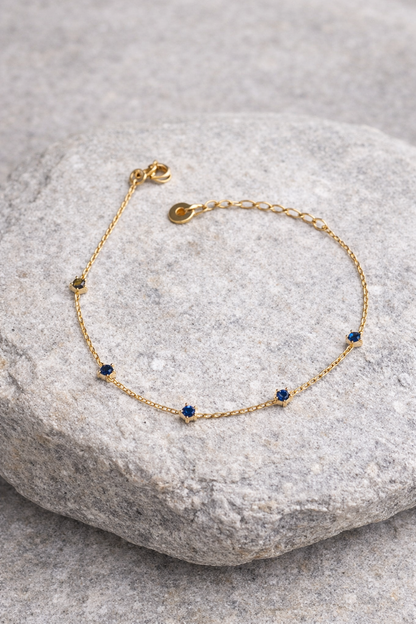 Gold chain bracelet with diamond pendant