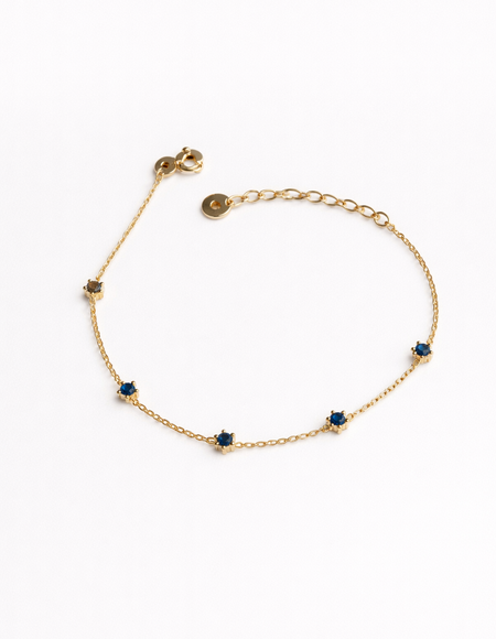 Gold chain bracelet with diamond pendant