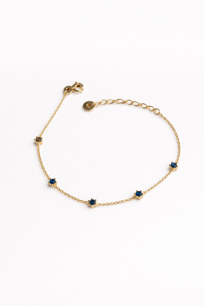 Gold chain bracelet with diamond pendant