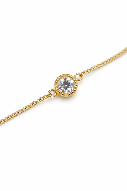 Gold chain bracelet with diamond pendant