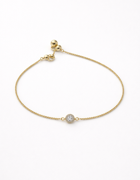 Gold chain bracelet with diamond pendant