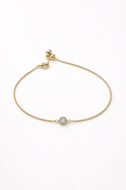 Gold chain bracelet with diamond pendant